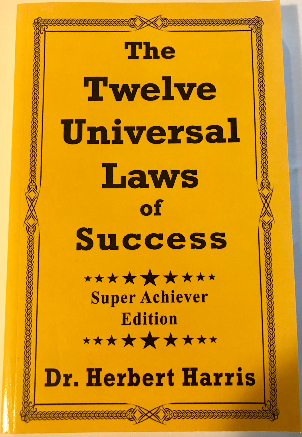 The Twelve Universal Laws of Success by Dr. Herbert Harris